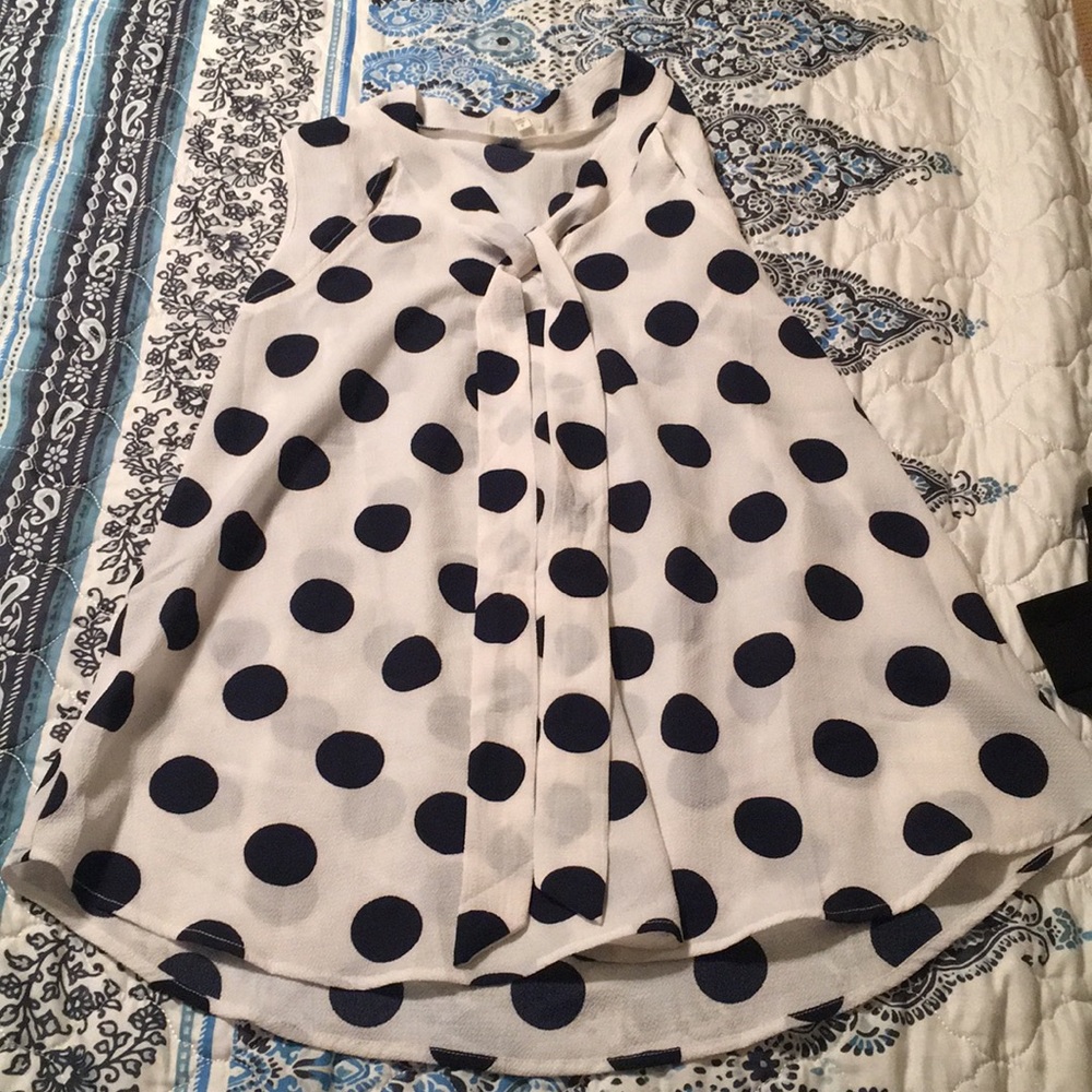 Super cute maternity sleeveless blouse!